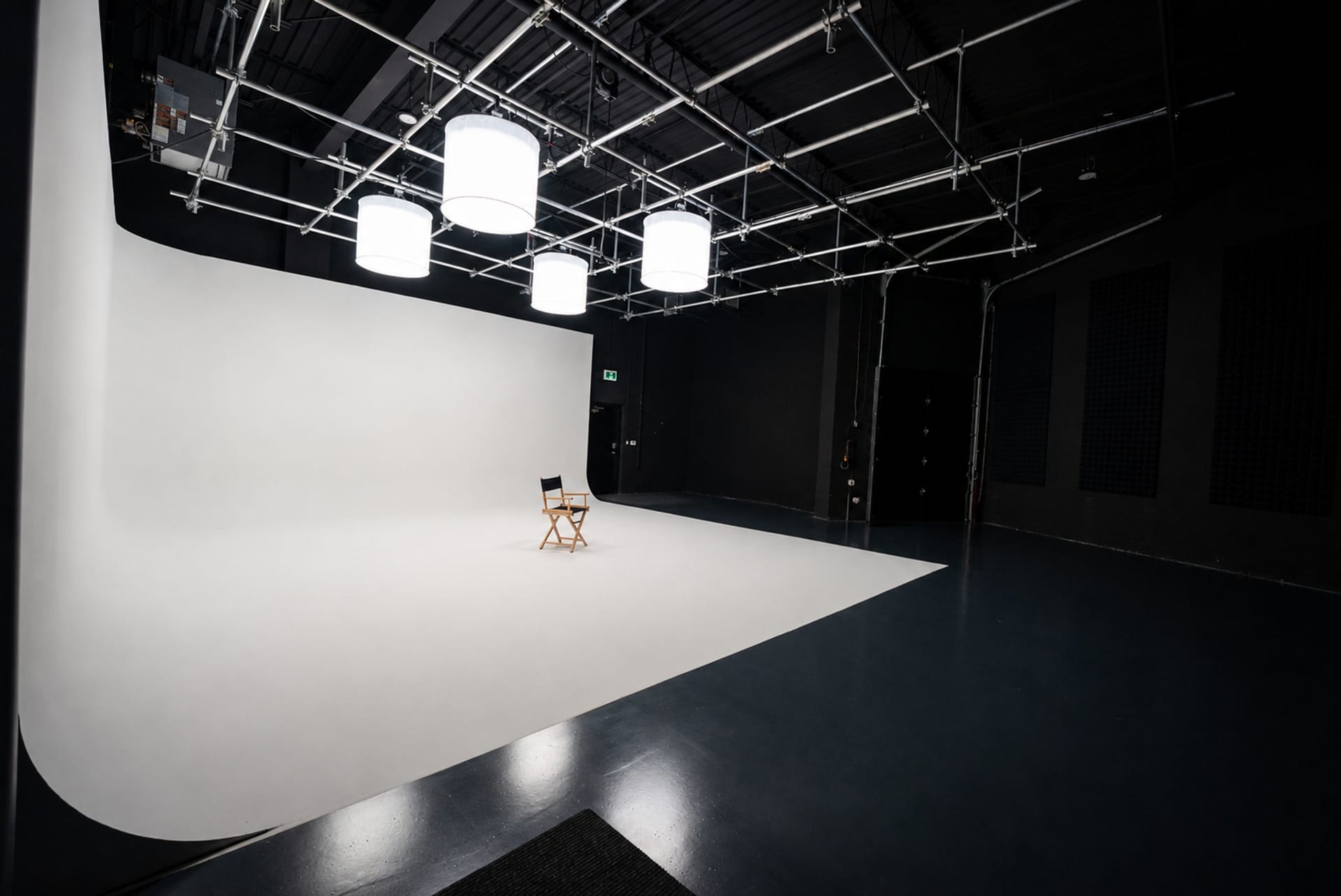 Main soundstage at Viva Studios with a white cyc wall and black ceiling